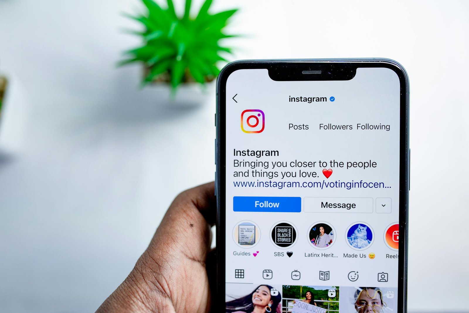 Close-up of a smartphone displaying the Instagram app, emphasizing social media connection.